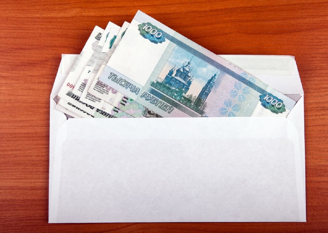 ЮMoney: 26% россиян копят наличные в конверте
